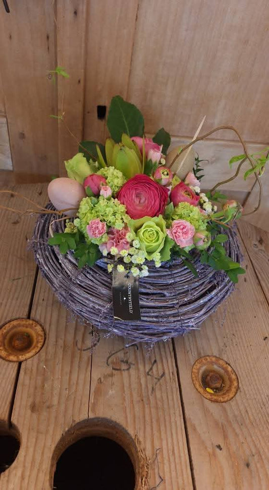 Flower arrangement in reed